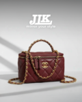 Chanel Burgundy Quilted Vanity Bag with Gold Chain .
