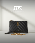 Saint Laurent Black Quilted Leather Pouch with Gold Chain .