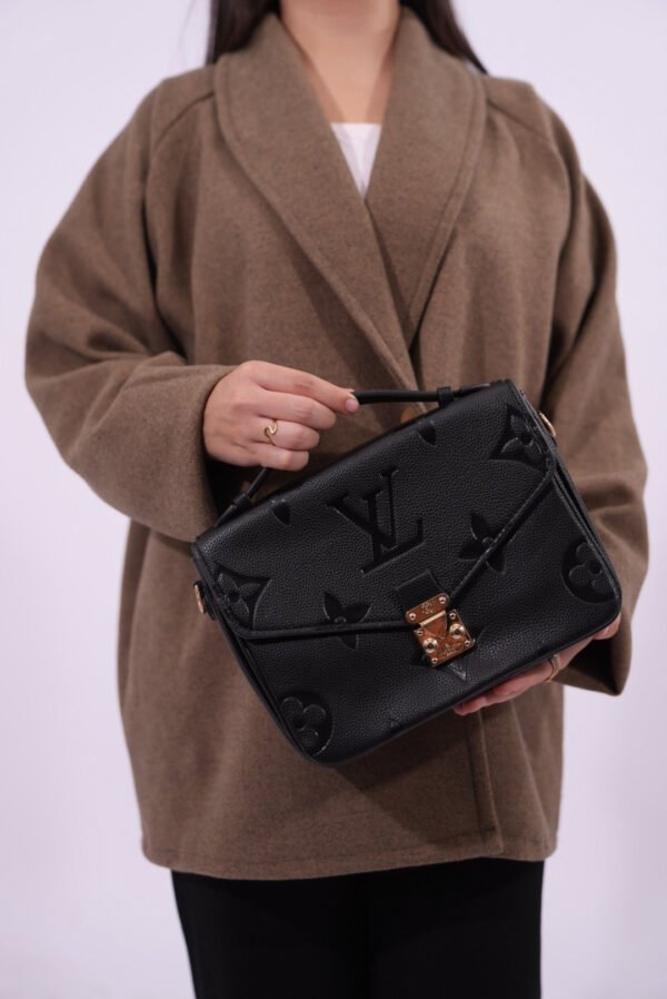 Louis Vuitton Pochette Métis .